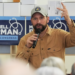 Democratic congressional candidate Mitchell Berman talks to supporters at Wilson's Coffee and Tea in Racine, Wis., Tuesday, Sept. 22, 2026.(AP Photo/Nam Y. Huh)