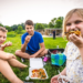 Children Eating Pizza in Lawn at The Stone Barn in Nelson (Photo: Travel Wisconsin)