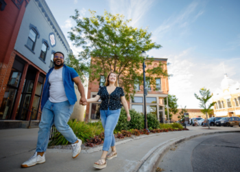 Couple walking downtown Steven's Point