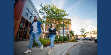 Couple walking downtown Steven's Point
