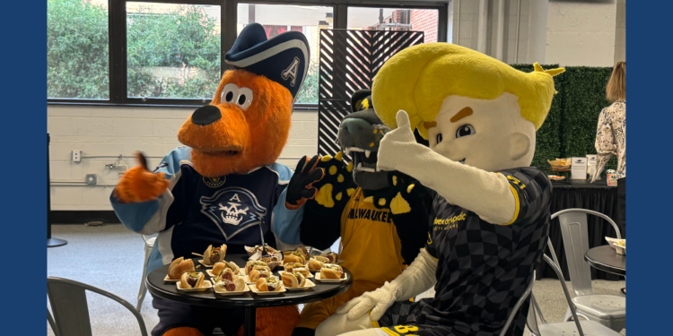 Milwaukee Admirals, UWM Panthers, and Milwaukee Wave mascots Roscoe, Pounce, and Brad Beach try the new food offerings at UW Milwaukee Panther arena, September 10, 2026. (Photo: Elisabeth Montemurro)