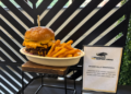 The Smashville Sandwich is a new food offering at UW-Milwaukee Panther arena for 2026. The sandwich features two smashed beef patties and a chicken patty. Photo: Elisabeth Montemurro, September 10, 2026)