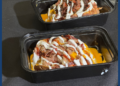 The "Brisket spud" - a new food offering at UW-Milwaukee Panther Arena for 2026. Photo: Elisabeth Montemurro, September 10, 2026.