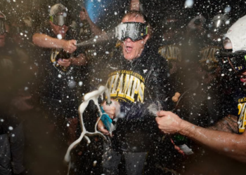 Pat Murphy pops champagne at PNC Park after the Brewers clinch the Division, September 15, 2026. (Photo: Brewers)