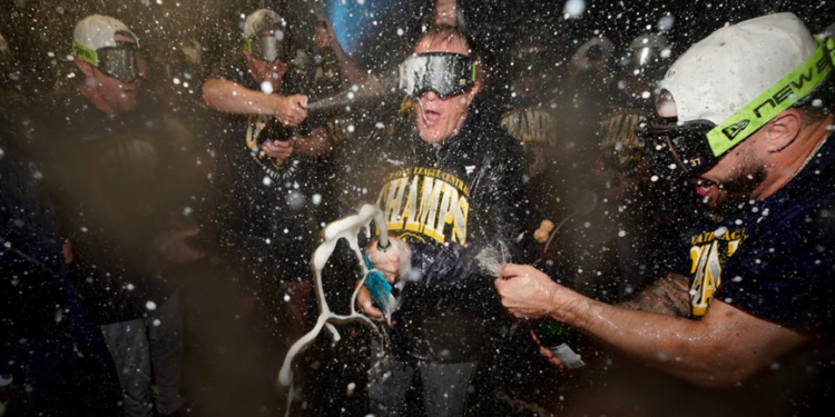 Pat Murphy pops champagne at PNC Park after the Brewers clinch the Division, September 15, 2026. (Photo: Brewers)
