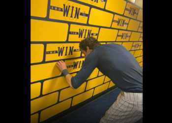 Lori Nickel shares story behind Brewers’ clubhouse win wall