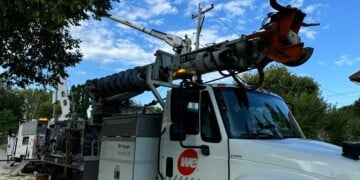 A crew from We Energies out in the field working to clear tree damage. (Photo credit We Energies)