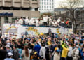 Brewers players wave to fans on top of their bus along the World Series Parade Route, October 30, 2026 (Photo: Nick Brown)
