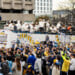 Brewers players wave to fans on top of their bus along the World Series Parade Route, October 30, 2026 (Photo: Nick Brown)