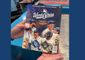 WTMJ receives an exclusive first look at the 2026 World Series program featuring the Milwaukee Brewers and Tampa Bay Rays printed at Quad's facility in Sussex, Wisconsin. October 20, 2026. Image Credit: Adam Roberts