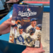 WTMJ receives an exclusive first look at the 2026 World Series program featuring the Milwaukee Brewers and Tampa Bay Rays printed at Quad's facility in Sussex, Wisconsin. October 20, 2026. Image Credit: Adam Roberts