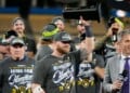 Milwaukee Brewers first baseman Jake Bauers hols the NLCS MVP trophy after Game 4 of baseball's National League Championship Series between the Milwaukee Brewers and the Los Angeles Dodgers, Thursday, Oct. 15, 2026, in Los Angeles. (AP Photo/Ashley Landis)