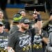 Milwaukee Brewers first baseman Jake Bauers hols the NLCS MVP trophy after Game 4 of baseball's National League Championship Series between the Milwaukee Brewers and the Los Angeles Dodgers, Thursday, Oct. 15, 2026, in Los Angeles. (AP Photo/Ashley Landis)