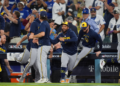 The Milwaukee Brewers celebrates after the final out of Game 4 of baseball's National League Championship Series between the Milwaukee Brewers and the Los Angeles Dodgers, Thursday, Oct. 15, 2026, in Los Angeles. (AP Photo/Gregory Bull)