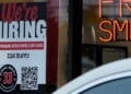 A hiring sign is displayed at a sandwich shop, in Streamwood, Ill., Wednesday, Sept. 16, 2026. (AP Photo/Nam Y. Huh)