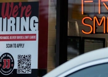 A hiring sign is displayed at a sandwich shop, in Streamwood, Ill., Wednesday, Sept. 16, 2026. (AP Photo/Nam Y. Huh)