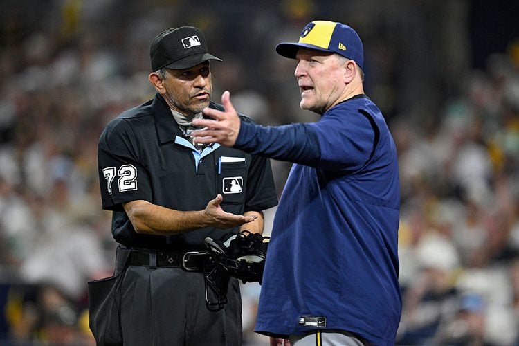 Pat Murphy discusses a call with the home plate umpire at Petco Park.