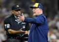 Pat Murphy discusses a call with the home plate umpire at Petco Park.