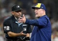 Pat Murphy discusses a call with the home plate umpire at Petco Park.
