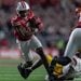 Abu Sama III carries the football at Camp Randall against USC.