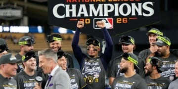 The Milwaukee Brewers celebrate after Game 4 of baseball's National League Championship Series between the Milwaukee Brewers and the Los Angeles Dodgers, Thursday, Oct. 15, 2026, in Los Angeles. (AP Photo/Ashley Landis)
