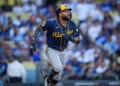 Milwaukee Brewers left fielder Jackson Chourio watches his solo home run take flight during the first inning of Game 3 of baseball's National League Championship Series between the Milwaukee Brewers and the Los Angeles Dodgers, Wednesday, Oct. 14, 2026, in Los Angeles. (AP Photo/Gregory Bull)
