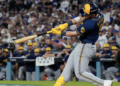 Milwaukee Brewers first baseman Jake Bauers connects for a two run home run during the seventh inning of Game 3 of baseball's National League Championship Series between the Milwaukee Brewers and the Los Angeles Dodgers, Wednesday, Oct. 14, 2026, in Los Angeles. (AP Photo/Ashley Landis)