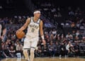 Milwaukee Bucks' guard Tyler Herro, left, brings the ball up the court against Minnesota Timberwolves forward Jaden McDaniels', right, during a preseason NBA basketball game Monday, Oct. 5, 2026, in Milwaukee. (AP Photo/Kylie Bridenhagen)