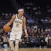 Milwaukee Bucks' guard Tyler Herro, left, brings the ball up the court against Minnesota Timberwolves forward Jaden McDaniels', right, during a preseason NBA basketball game Monday, Oct. 5, 2026, in Milwaukee. (AP Photo/Kylie Bridenhagen)