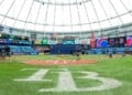Crews prepare the field for a baseball game between the Chicago Cubs and the Boston Red Sox at Tropicana Field, Sunday, Sept. 27, 2026, in St. Petersburg, Fla. (AP Photo/Chris Urso)