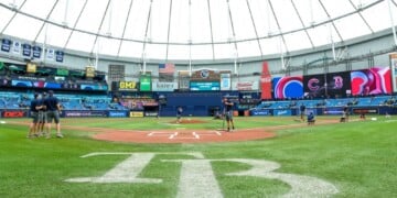 Crews prepare the field for a baseball game between the Chicago Cubs and the Boston Red Sox at Tropicana Field, Sunday, Sept. 27, 2026, in St. Petersburg, Fla. (AP Photo/Chris Urso)