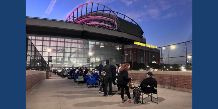 Fans line up to enter the NLDS Game 3 watch party at UW Credit Union Plaza outside American Family Field on October 6, 2026 (Photo: Elisabeth Montemurro)