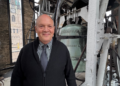 Mark Konewko, the Marquette University Carillonneur and Director of the University Chorus and Chamber Choir stands in the Carillon bell tower after playing "Roll out the Barrell" ahead of the Brewers NLCS game 4 on October 15, 2026. (Photo: Elisabeth Montemurro)