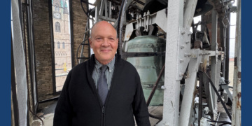 Mark Konewko, the Marquette University Carillonneur and Director of the University Chorus and Chamber Choir stands in the Carillon bell tower after playing "Roll out the Barrell" ahead of the Brewers NLCS game 4 on October 15, 2026. (Photo: Elisabeth Montemurro)