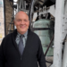 Mark Konewko, the Marquette University Carillonneur and Director of the University Chorus and Chamber Choir stands in the Carillon bell tower after playing "Roll out the Barrell" ahead of the Brewers NLCS game 4 on October 15, 2026. (Photo: Elisabeth Montemurro)
