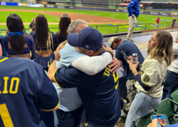 Fans hug at American Family Field as the fans win the World Series, October 28, 2026 (Photo: Elisabeth Montemurro)