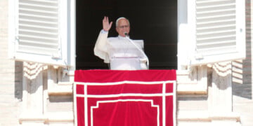 Pope Leo XIV leaves at the end the Angelus prayer in St. Peter's Square at the Vatican, Sunday, Oct. 11, 2026. (AP Photo/Gregorio Borgia)