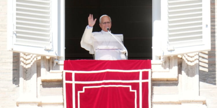 Pope Leo XIV leaves at the end the Angelus prayer in St. Peter's Square at the Vatican, Sunday, Oct. 11, 2026. (AP Photo/Gregorio Borgia)
