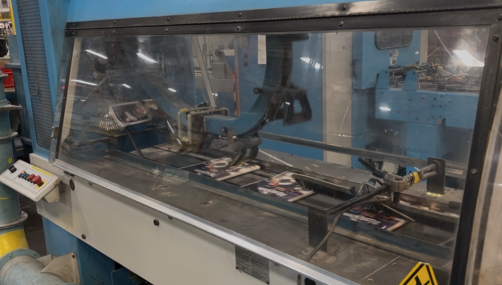 Copies of the official 2026 World Series program work their way through the machinery at Quad's facility in Sussex, Wisconsin. October 20, 2026. Image Credit: Adam Roberts